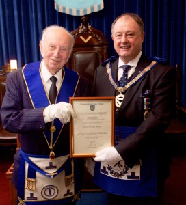 W.Bro Vic receives his 50 year certificate from W. Bro Paul Reeves APGM